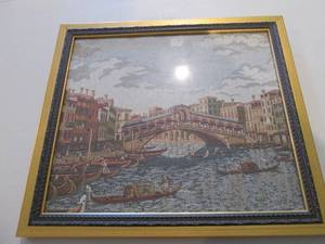 Framed cloth artwork...