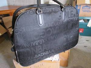 Fancy luggage bag on wheels with a ...
