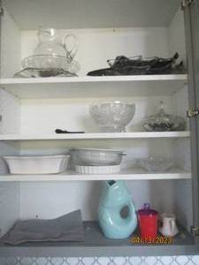 Cupboard filled with crystal, and o...