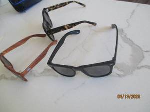 3 Pairs of sumglasses...