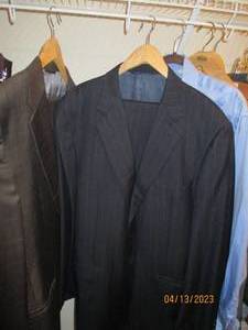 Lot of mens suits and ties...