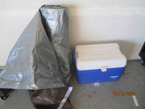 Large tarp and Igloo cooler...