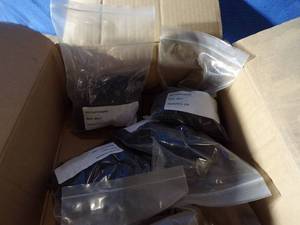 lot 64 image: Box Full of RS Fasteners #8 X 1 (Each Sealed Bag Contains 300)