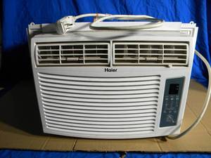 lot 16 image: Haier Window AC Unit