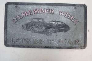 lot 15 image: Cast Metal Sign