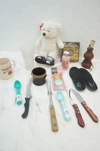 lot 48 image: Build a Bear and toothbrush holder
