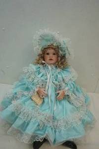 lot 103 image: Doll by Gladys Benson