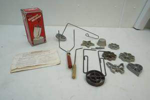lot 161 image: Rosette iron