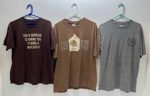 lot 24 image: Group Of Misc. Beer And More Advertisement T-Shirts Sizes L, XL