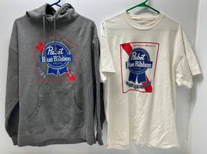 lot 27 image: Three Pabst Blue Ribbon Advertisement Shirts 1 White XXL T-Shirt  L Grey Hoodie Sweatshirt