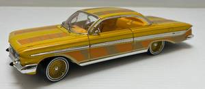lot 48 image: 2005 Malibu International 118 Scale 1961 Impala Die-Cast Low Rider