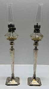 lot 52 image: Two RARE KMK Candle Stick Oil Lamps Marked (Sterling Silver) Reinforced With Cement 17 38 Tall 10 14 With Out Oil Lamp Candle Sticks Weight 1 348 Grams 12.3 Oz. 1 351 Grams 12.4 Oz.