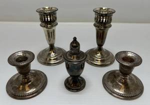 lot 56 image: Group Of Misc. STERLING Weighted Candle Holders And One Salt Shaker Total Overall Weight 1125 Grams  39.7 Oz.