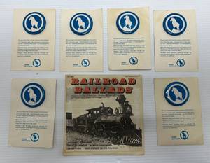 lot 184 image: 6 Great Northern Railroad Buttons On Original Cards And 1975 Railroad Ballads