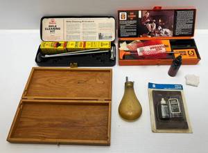 lot 207 image: Group Of Misc. Gun Cleaning Kits Including Vintage Black Gun Powder Holder