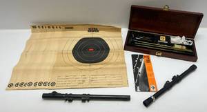 lot 209 image: Group Of Misc. Including Wooden Box, Vintage Scopes 1 Savage -Suwa Model 0415 4x15 1 Mossberg No. M4c 4 Power  And Vintage Paper Targets.