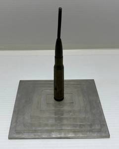 lot 231 image: WW2 Trench Art Piece (Made From Piece Of Aircraft) Has Print On Bottom Feb. 14, 1945, NWA Gun Butt