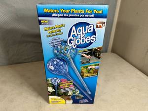 lot 77 image: New Box of 2 Aqua Globe Glass Plant Waterers
