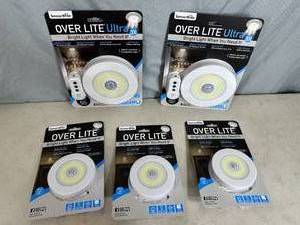 lot 101 image: 5 New Over Lite Ultra Battery LED Light Fixtures