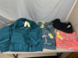 lot 129 image: 9 New Pieces of Clothing