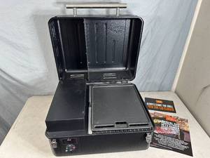 lot 1 image: New Traeger Ranger Portable Pellet Grill