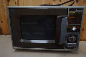 lot 11 image: Vintage Samsung Microwave with Pots and Pans