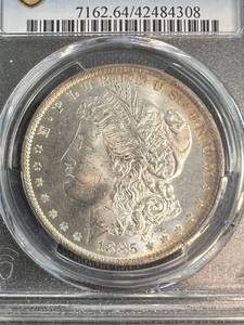 1885-O US MORGAN SILVER DOLLAR MS64 PCGS
