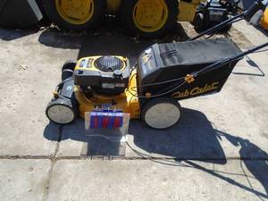Cub Cadet self propelled electric start lawn mower with bagger. Used condition. No battery or charger. Does start & run with jump. No pull start. Appeared to have oil leak. Does run but as is. As shown.
