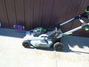 E-Go 56 volt self propelled mower. Used condition. No battery or charger. Untested. As shown.