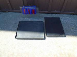 Qty of 2 cast BBQ griddle plates. Look new. As shown.
