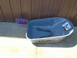New Truper 5.5 cubic foot wheel barrow tub & feet. As shown.