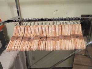 lot 24 image: 48 Pack lot of Wooden Hangers (6 - 8 Packs)