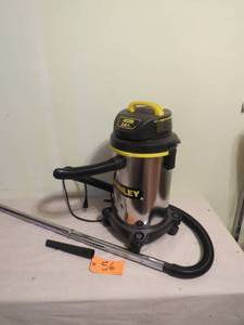 lot 56 image: Stanley 4 Gallon Stainless WetDry Vacuum 2.8 HP Dented