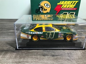 lot 152 image: 1999 NASCAR Revell Collection  Jarrett Favre MotorSports In. Dale Jarrett #11  Green Bay Packers 124 scale die cast stock car