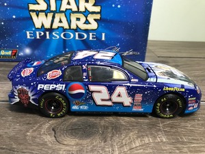 lot 153 image: 1999 NASCAR Revell Collection Jeff Gordon #24  Star Wars Episode I 124 & 164 scale die cast coin bank set