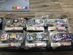 lot 160 image: 1999 NASCAR Racing Champions introduction set  12 silver chrome commemorative cars 164 scale die cast