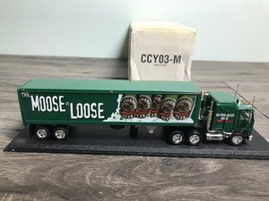 lot 166 image: 1997 Matchbox Moosehead Beer Kenworth Semi Truck & Trailer Die Cast- CCY03-M