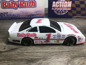 lot 205 image: 1998 Nascar Racing Action Platinum Series 1992 Thunderbird Jeff Gordon #1  Baby Ruth 124 scale die cast coin bank