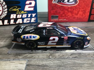 lot 218 image: 2000 NASCAR Action  RCCA edition Rusty Wallace #2 Miller Lite  10th Anniversary 124 scale die cast coin bank