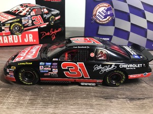 lot 232 image: 1999 Nascar Action Racing Collectibles 1996 Monte Carlo Dale Earnhardt Jr. #31  Mom N Pop 124 scale die cast stock car