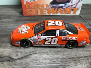 lot 311 image: 2000 Nascar Revell Collection Tony Stewart #20 Home Depot   Rookie of the Year 124 scale die cast coin bank stock car