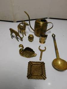 lot 32 image: Brass animals, watering can, ladle and more