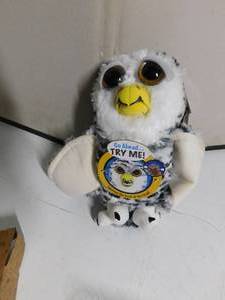 lot 37 image: Feisty Pet owl and Nutty Toy