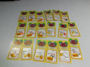 lot 57 image: Flat of new fishing spinners