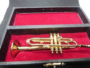 lot 67 image: Mini Trombone in case