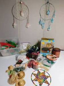 lot 109 image: Craft stuff, tins, 3 dream catchers and a bundt pan