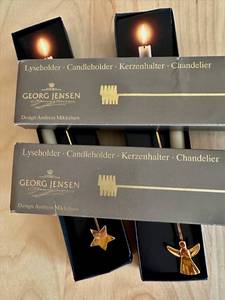 lot 103 image: Georg Jensen Christmas Candleholders by Andreas Mikkelsen