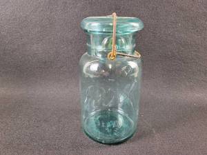 lot 286 image: ca. 1920s Ball wire Lid Quart Blue Mason Jar - Has Crack