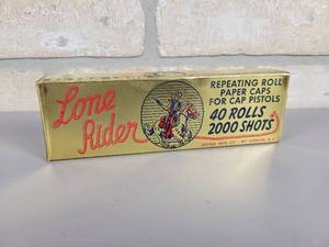 lot 303 image: Vintage Lone Rider Repeating Roll Paper Caps - Box is Full
