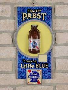 lot 328 image: PABST 7 Ounce Little Blue Advertising Beer Sign